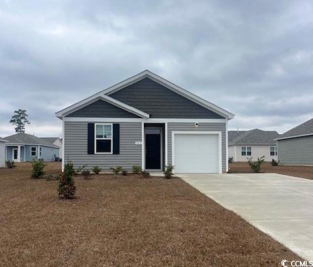 Single story home with a garage