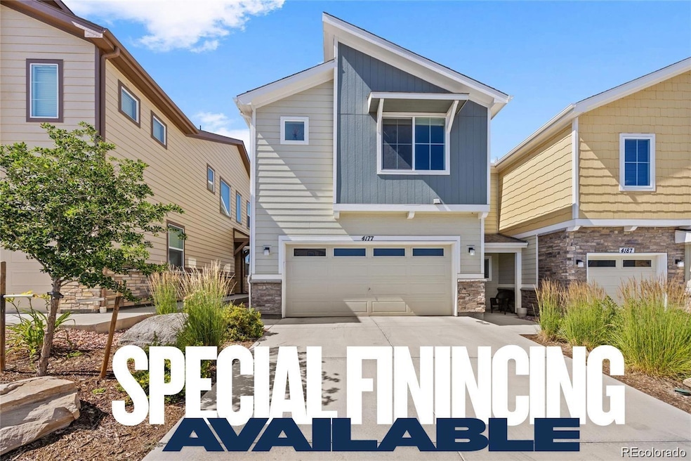 Spacious 2 car garage with 220 volt EV charger hookup.