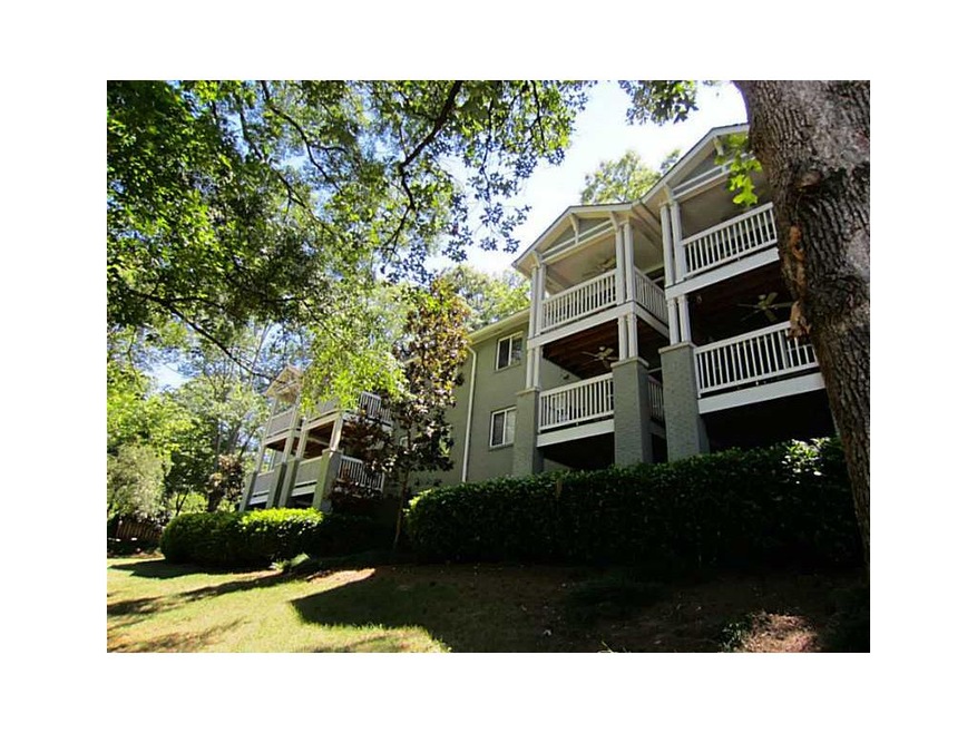 Exterior Front. Upstairs with Wooded View.