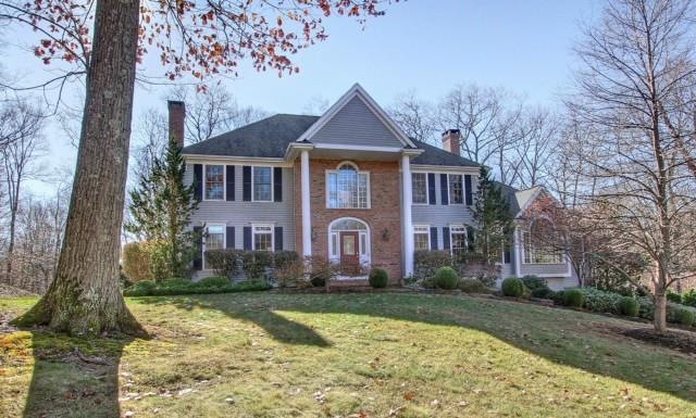 timeless center hall colonial with sweeping front 