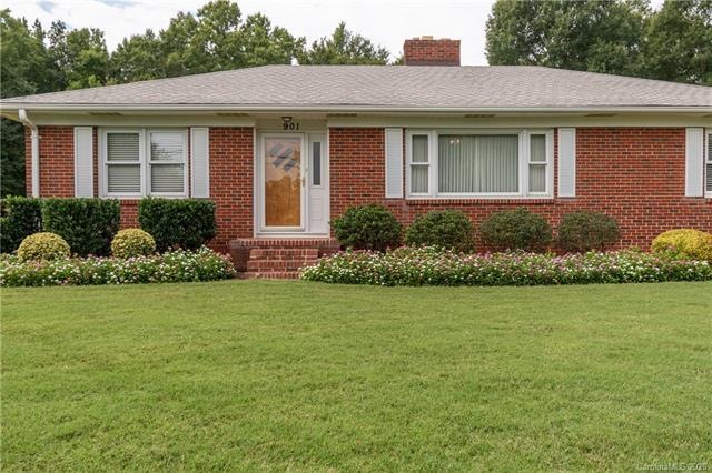 Immaculate mid century all brick ranch on .91 acre