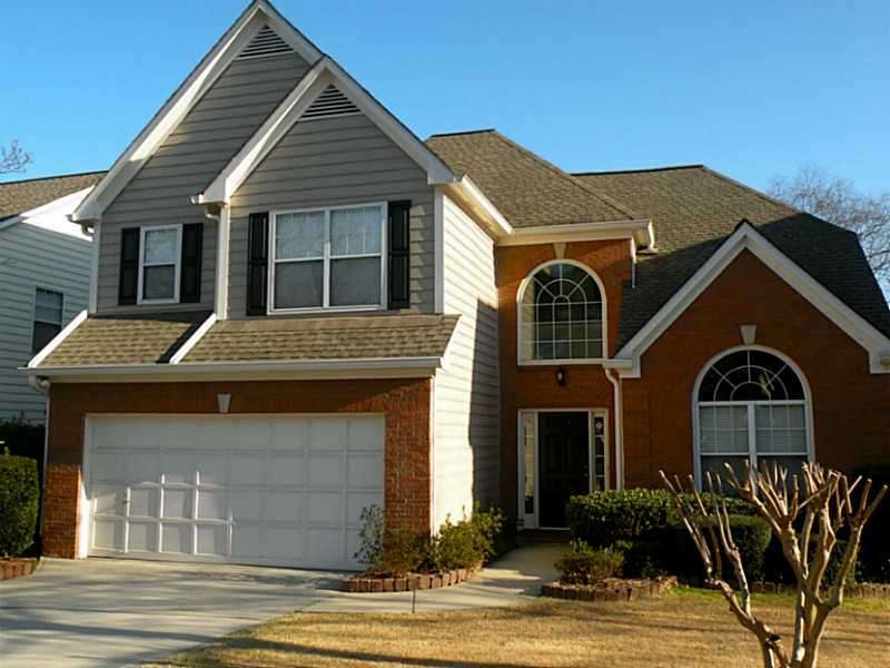 Exterior Front. Brick Front with Cement Siding Har