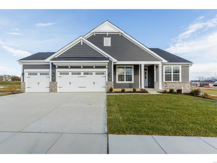 Charming Front Elevation with a 3 Car Garage