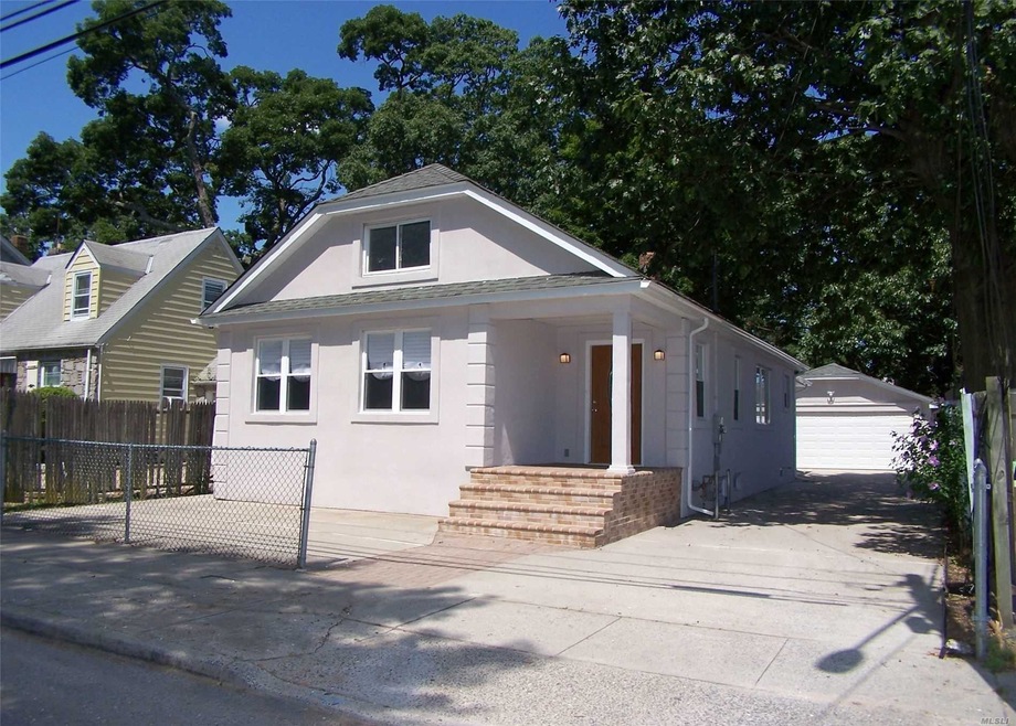 10 W Clinton Ave, Roosevelt, NY 11575 - photo 1