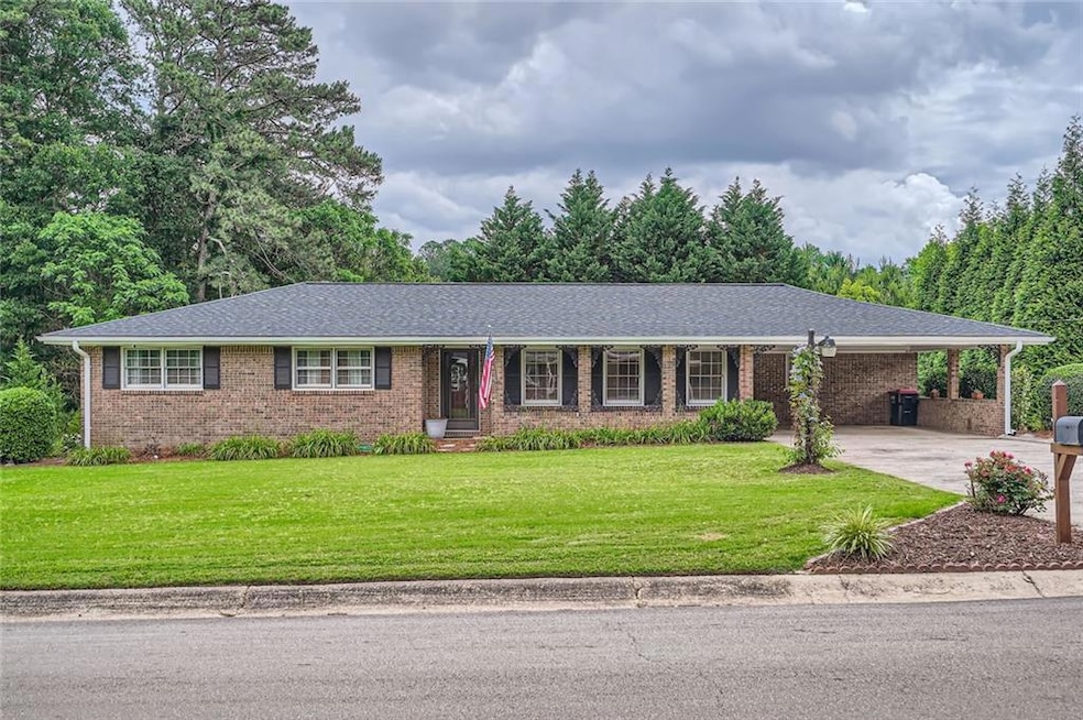 Welcome home to this IMMACULATE 4-sided brick ranc