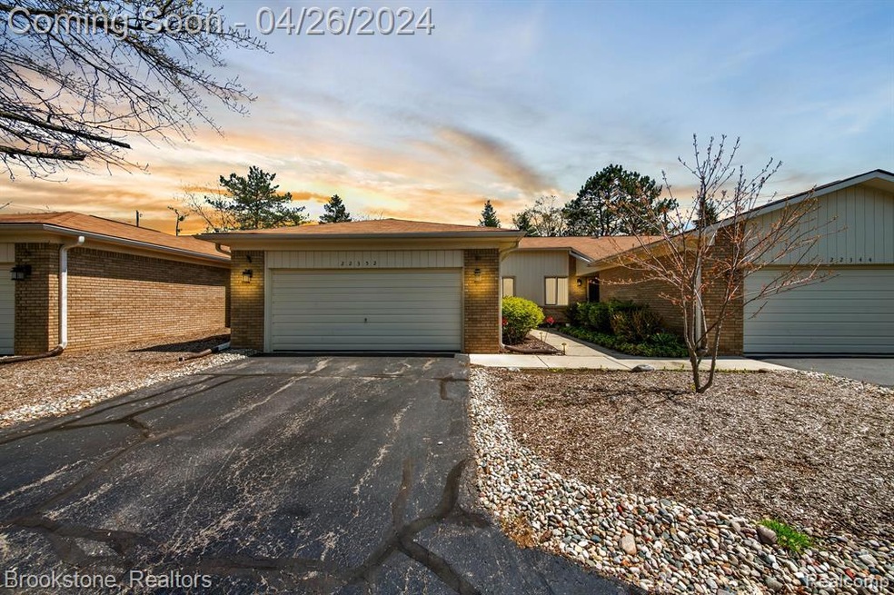 Front Of Condo With 2 Car Attached Garage