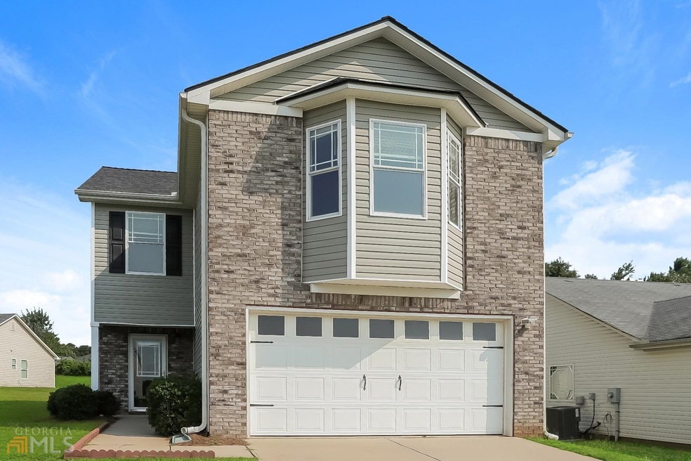 6876 Lockley Ct, Rex, GA 30273 - photo 1