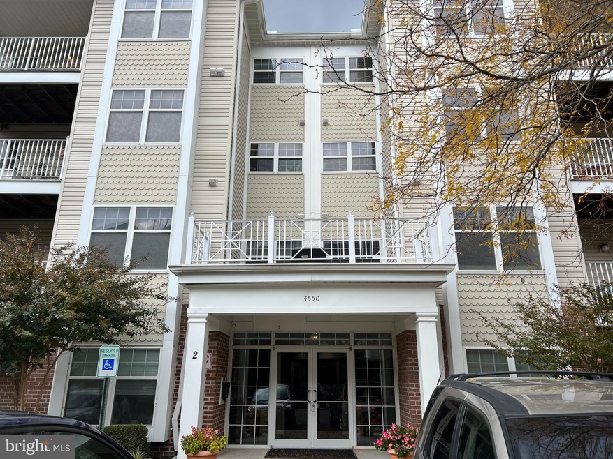 4550 Chaucer Way unit 305, Owings Mills, MD 21117 - photo 1