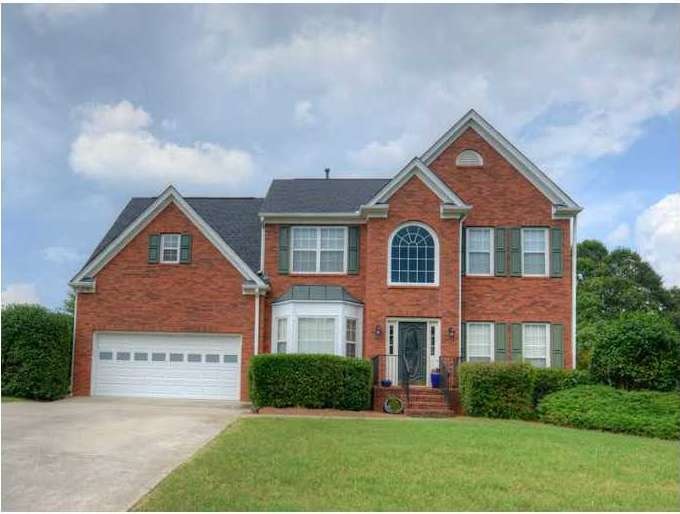 Exterior Front. Beautiful lake views!  Executive h