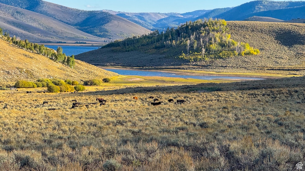 View of mountain backdrop with a large body of water