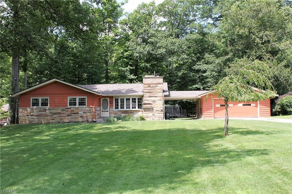 Welcome to 7504 James in North Royalton.  This home backs up to the deep wooded lots off Wallings Road which have a creek/ravine that run near the end of their properties.  It is a wooded retreat!
