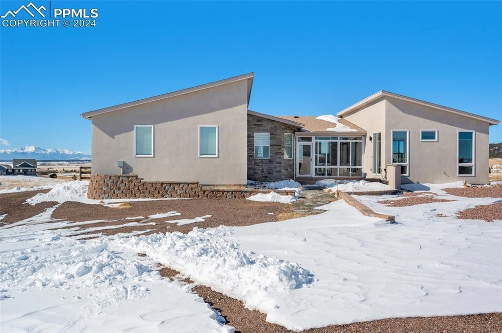 Contemporary home with a delightful sunroom entry.