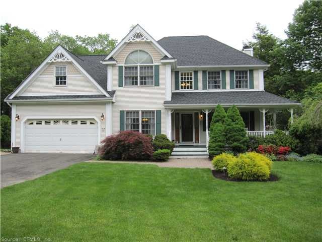 Exterior Front. Professionally landscaped