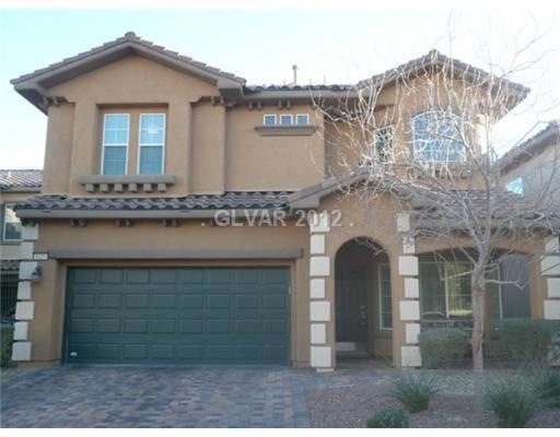 Property Photo. Brick paver driveway invites you i