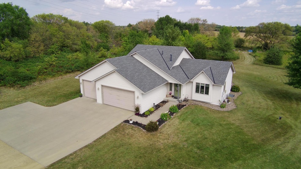 Welcome to 696 Zephyr Lane.  This spacious 2.49 acre lot creates privacy, while keeping you connected to both Hudson and Stillwater within minutes.
