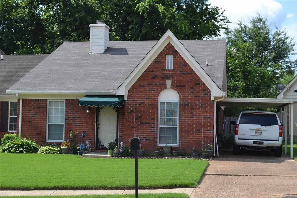 Notice the manicured lawn and landscaping in this 