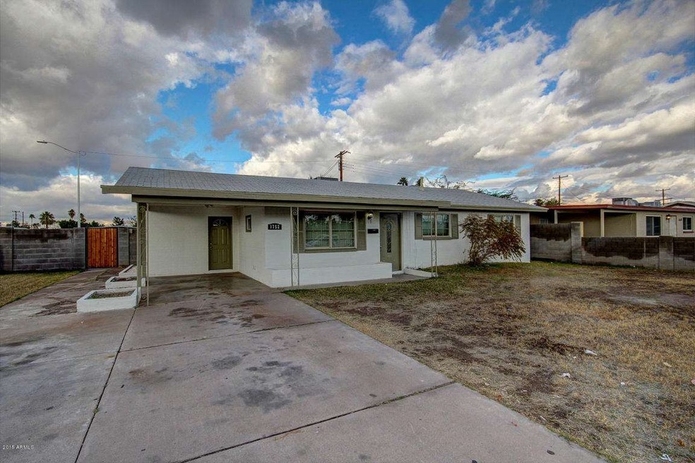 Front yard and car port