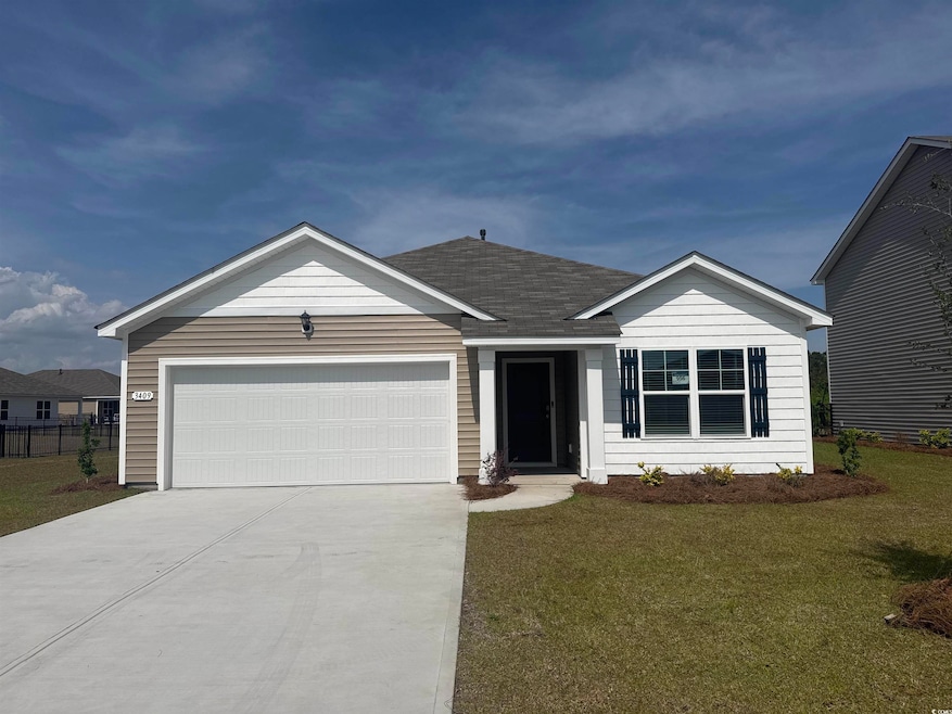 Ranch-style house featuring fence, a shingled roof