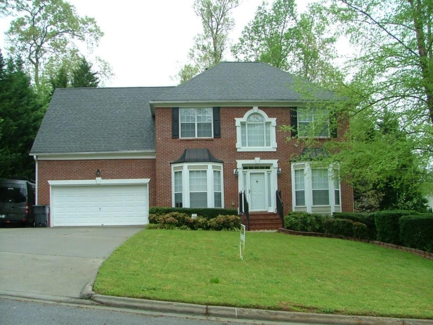 Brick front home with extra parking