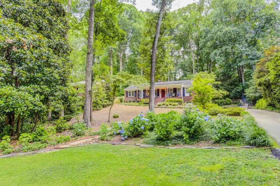 Welcoming rocking chair front porch with level dri