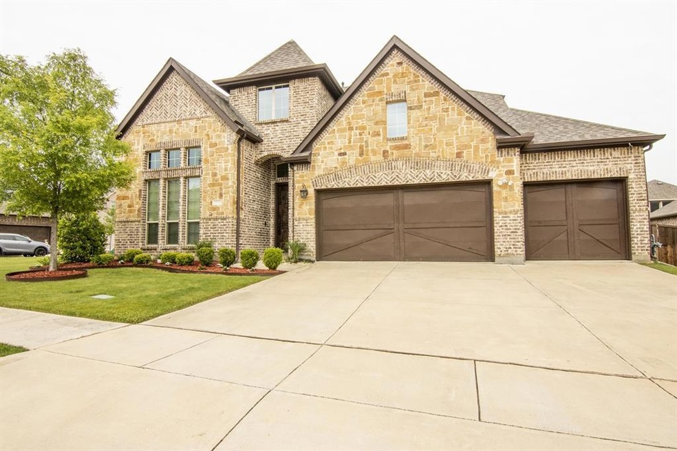 Almost quarter of an acre corner lot with 3 car ga