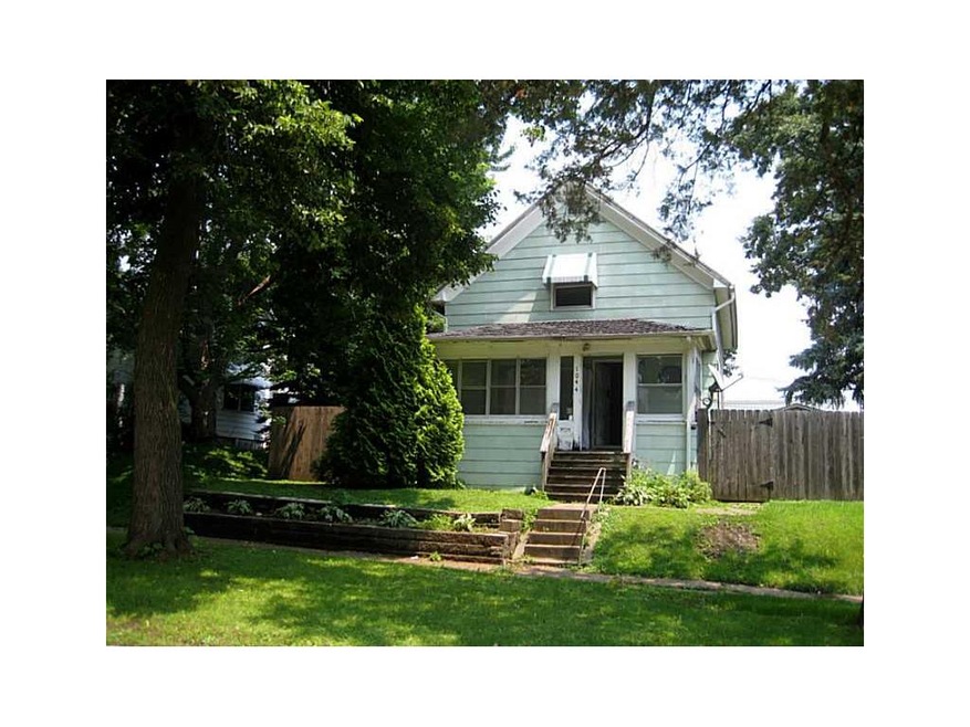 Front Exterior. Enclosed porch needs attention.