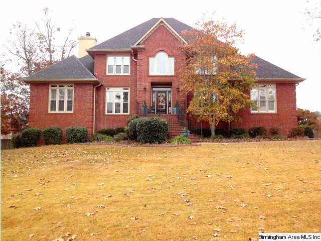 Stately brick on huge flat lot with beautiful ingr