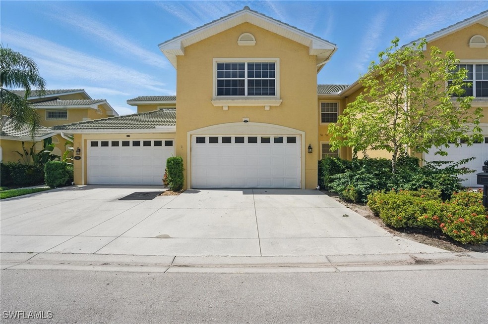 View of front of property featuring driveway, stuc