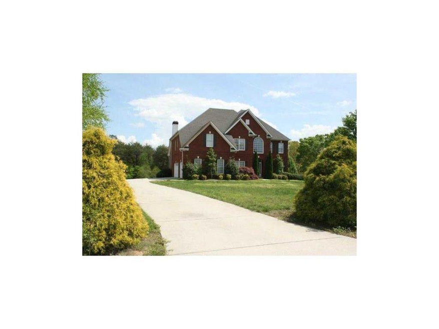 Exterior Front. 4 sided brick beauty, on 1.49 acre