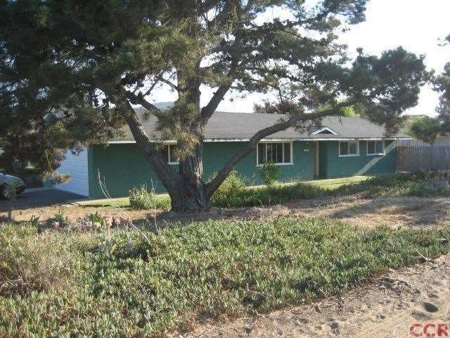 Sits comfortably on a large corner lot!