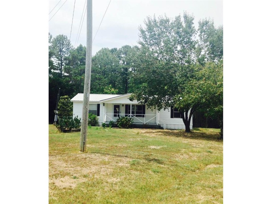 FRONT OF HOME ON 1.47 ACRES