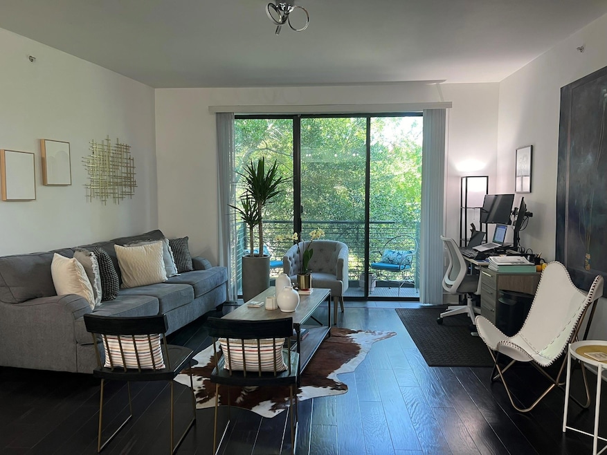 Living room featuring dark hardwood / wood-style f