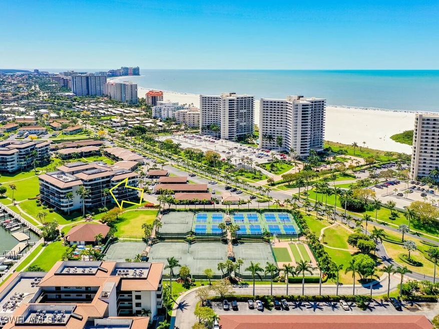Aerial view featuring a water view and a view of t