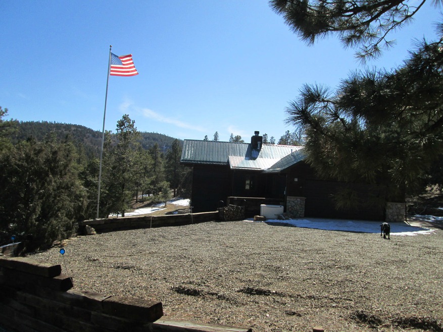 large driveway with American Flagpole