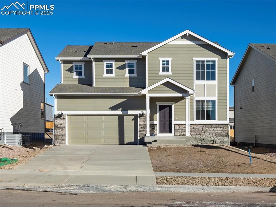 View of front of home with a garage
