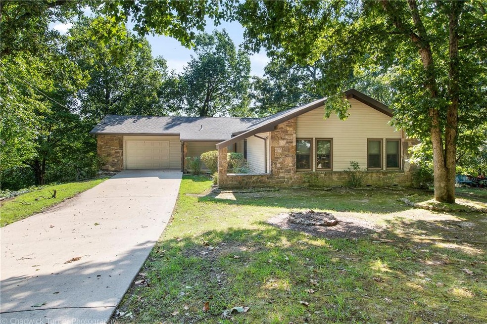 front elevation, newer windows,nice long driveway
