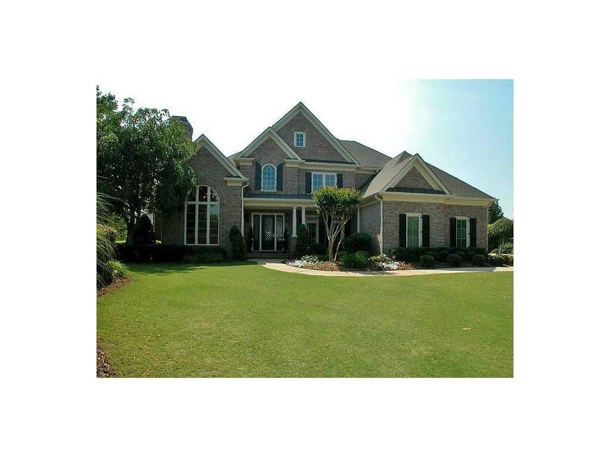 Exterior Front. Lovely four sides brick home on qu