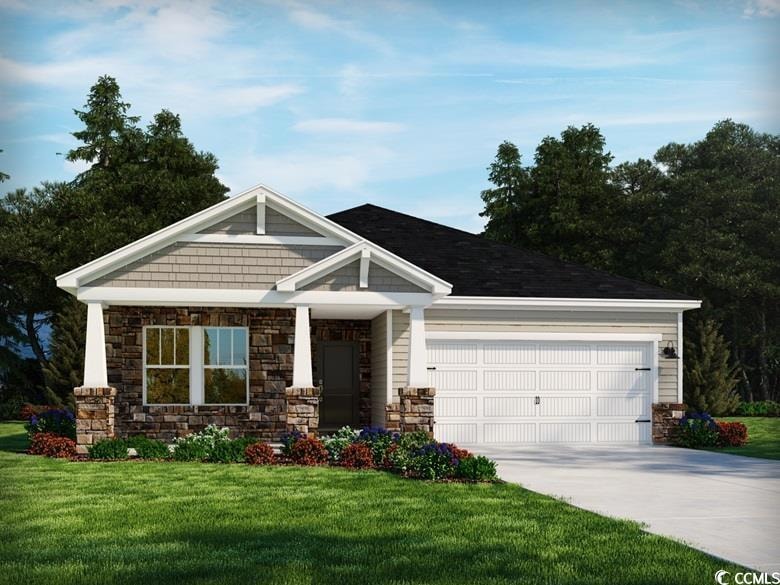 Craftsman-style house with a garage and a front la