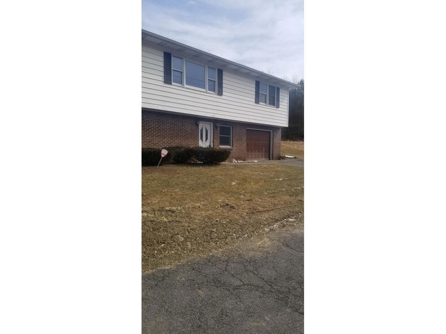 Room to park 2 cars and garage