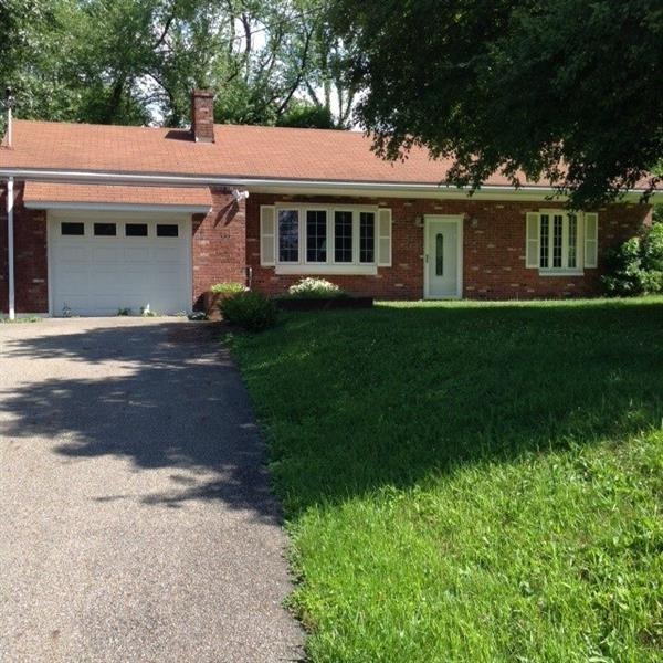 Red Brick white trim 2 bedroom 1.5 bath house with