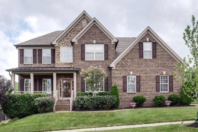 This stately home was built by Turnberry and is a Birkdale floor plan.