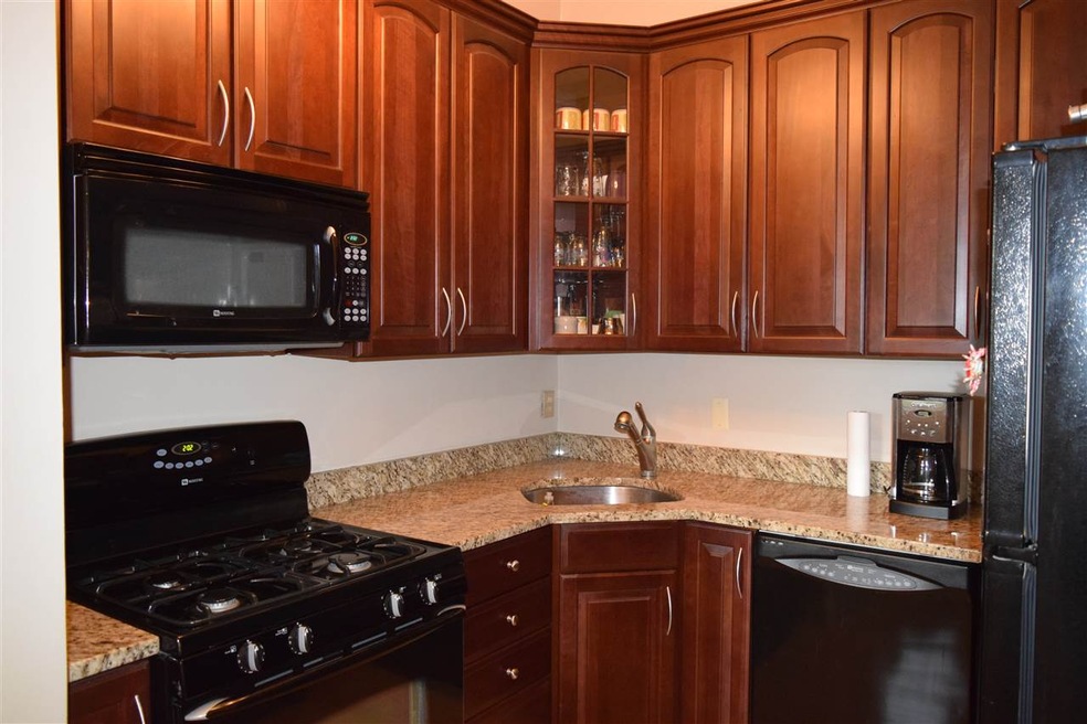 Emerson Mills unit 221, Pembroke, NH 03275 - photo 1