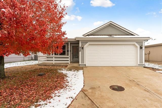 520 S Saturn Dr, Raymore, MO 64083 - photo 1