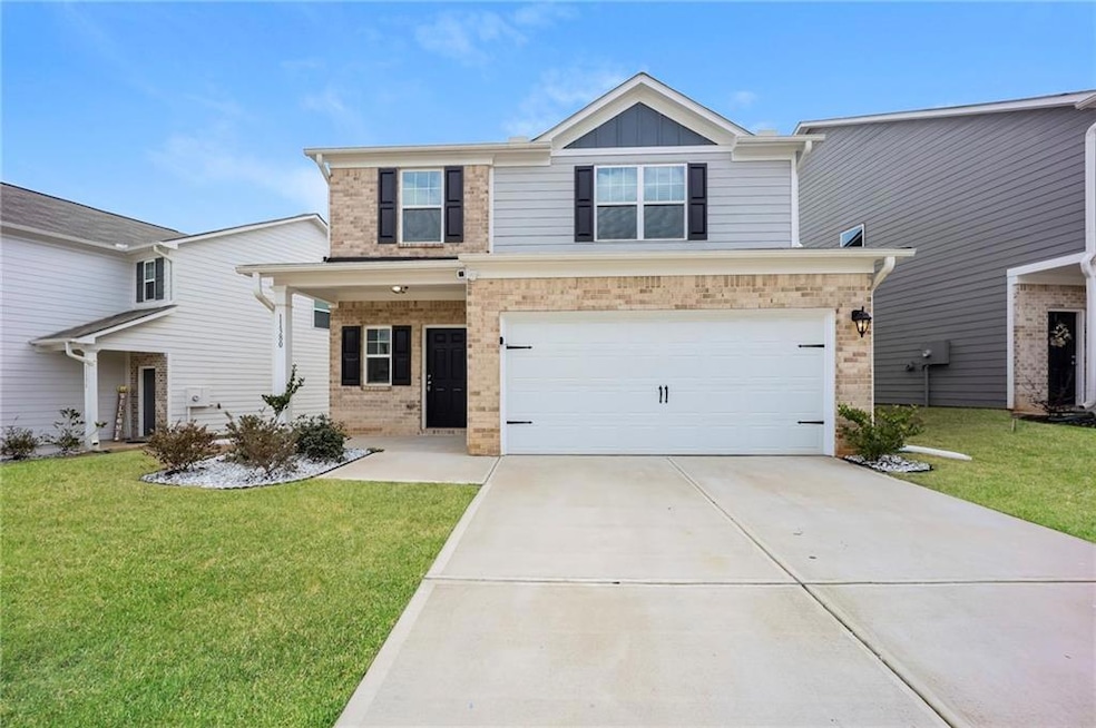 View of front of property featuring brick siding, 