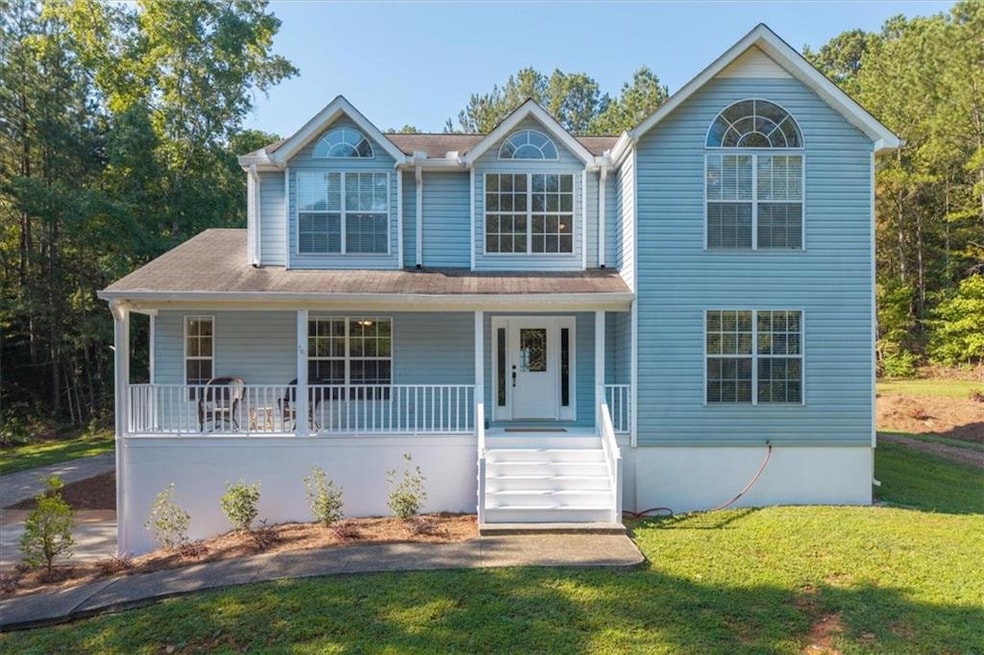 Cozy cape cod located on 10 acres!