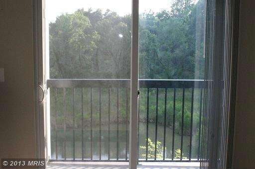 11350 Aristotle Dr unit 7-102, Fairfax, VA 22030 - photo 1