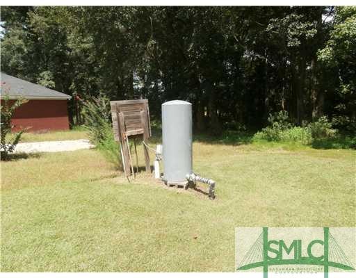 Exterior Front. one of the well pumps.