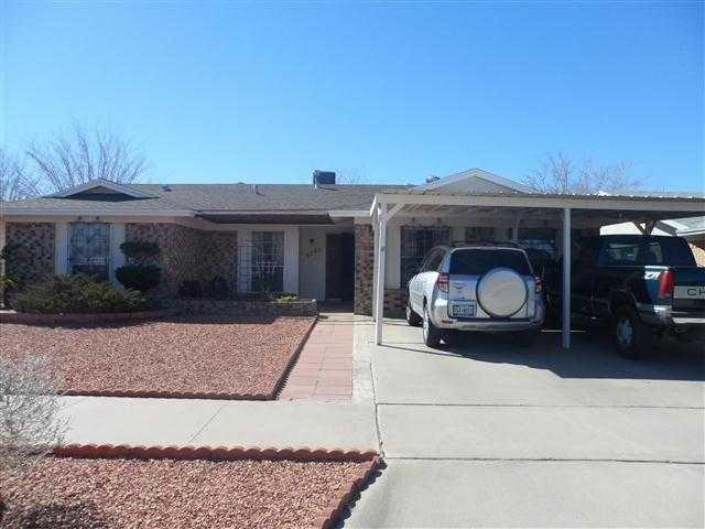 Exterior Front. easy care desert landsca