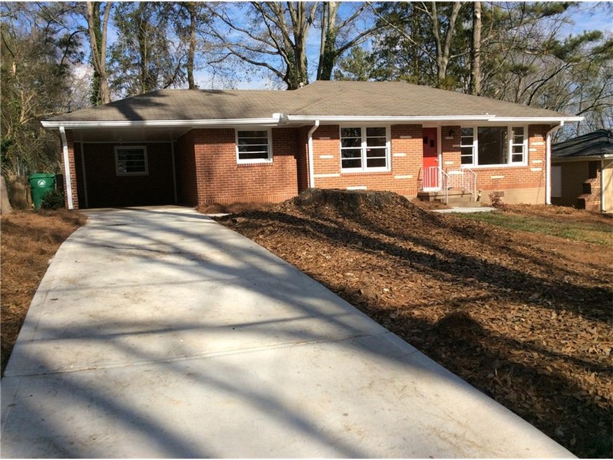 Front of house with new driveway