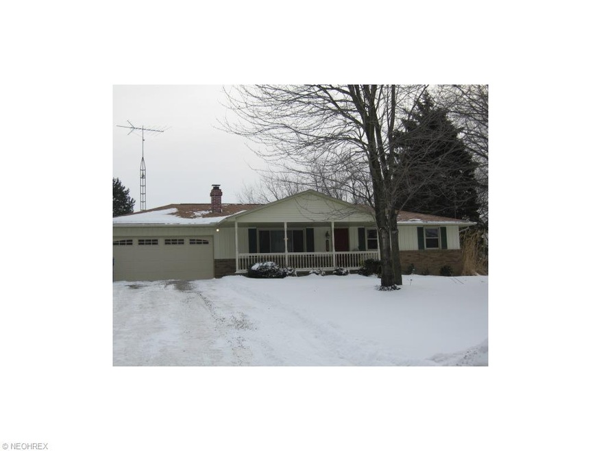 THIS HARTVILLE GEM IS TUCKED AWAY ON A LOVELY LOT 